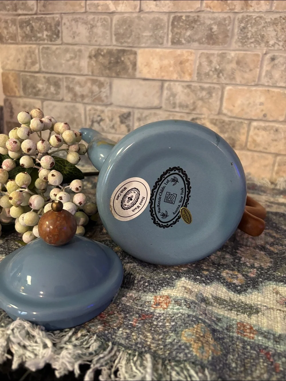 Camp Mackenzie-Childs enamel Blue Floral Teapot with decorative  wooden handle.